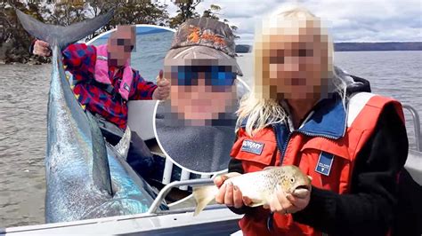 lady with trout full video|Pair accused of filming viral ‘Tassie trout’ video。